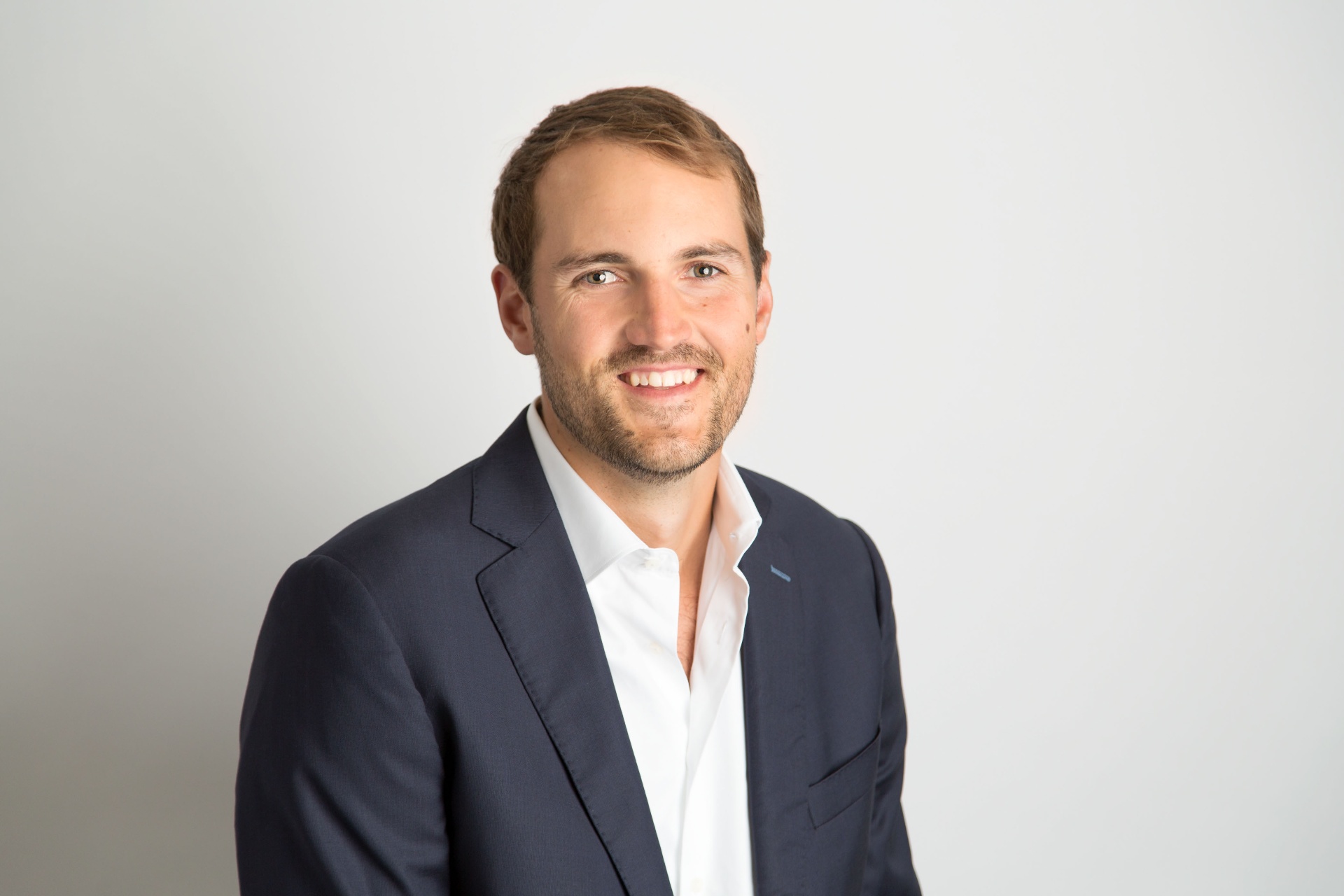 Spencer Packer, Founder and Fractional CMO of Brickhouse Strategy
